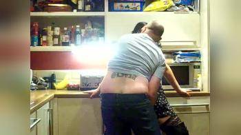 video of Wife getting fingered while husband watched in kitchen